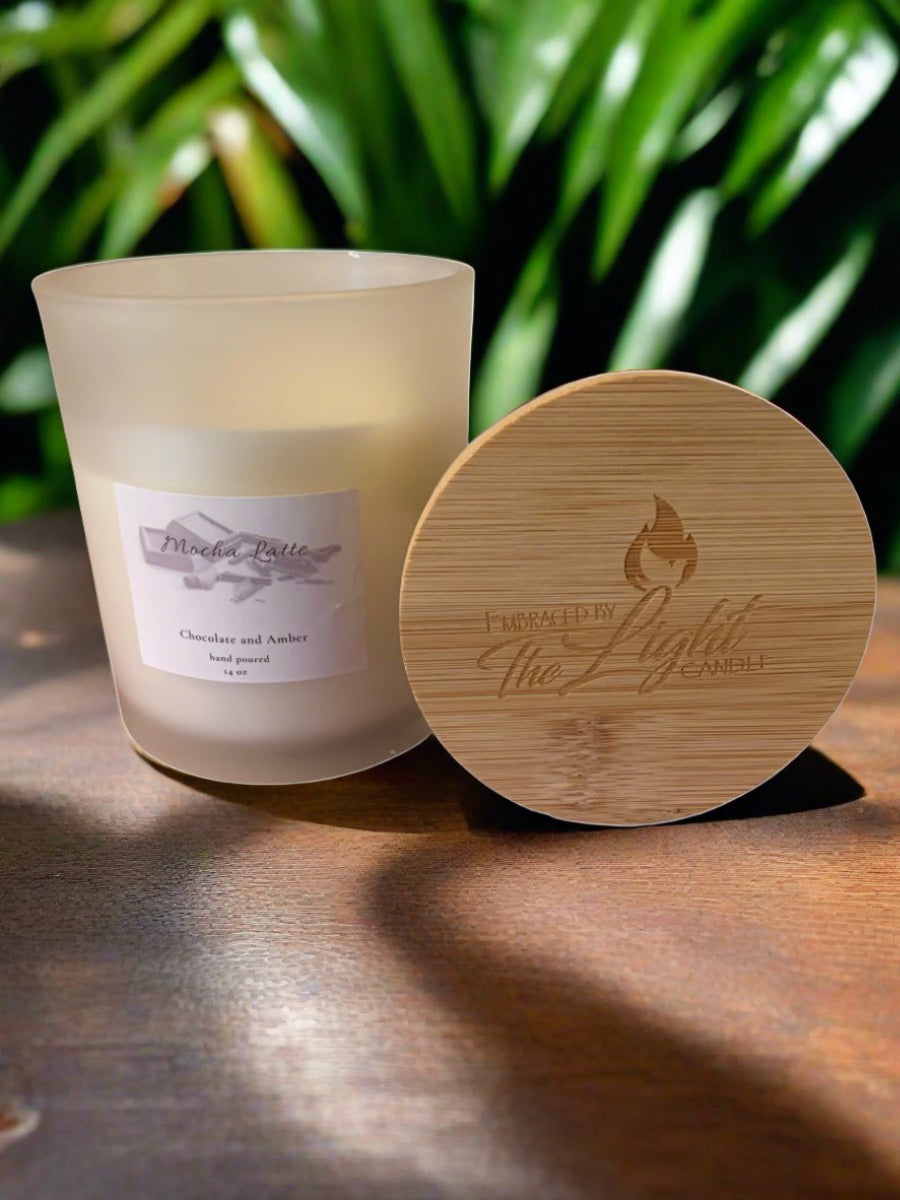 Indulge in the rich and smooth scent of our Mocha Latta 14 oz Candle. Infused with the delicious aroma of mocha, this candle will transport you to a cozy coffee shop, providing a warm and comforting ambience. Treat yourself or a loved one to this luxurious and indulgent experience.