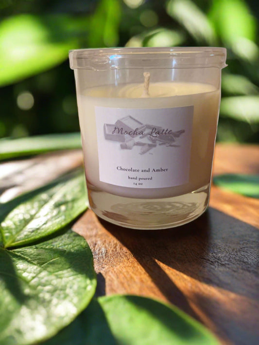 Indulge in the warm and comforting scent of our 11 oz Mocha Latta Soy Blend Candle. Made with a unique soy blend, this candle burns longer and cleaner while filling your home with the irresistible aroma of mocha and vanilla. Perfect for creating a cozy atmosphere and relaxing after a long day.