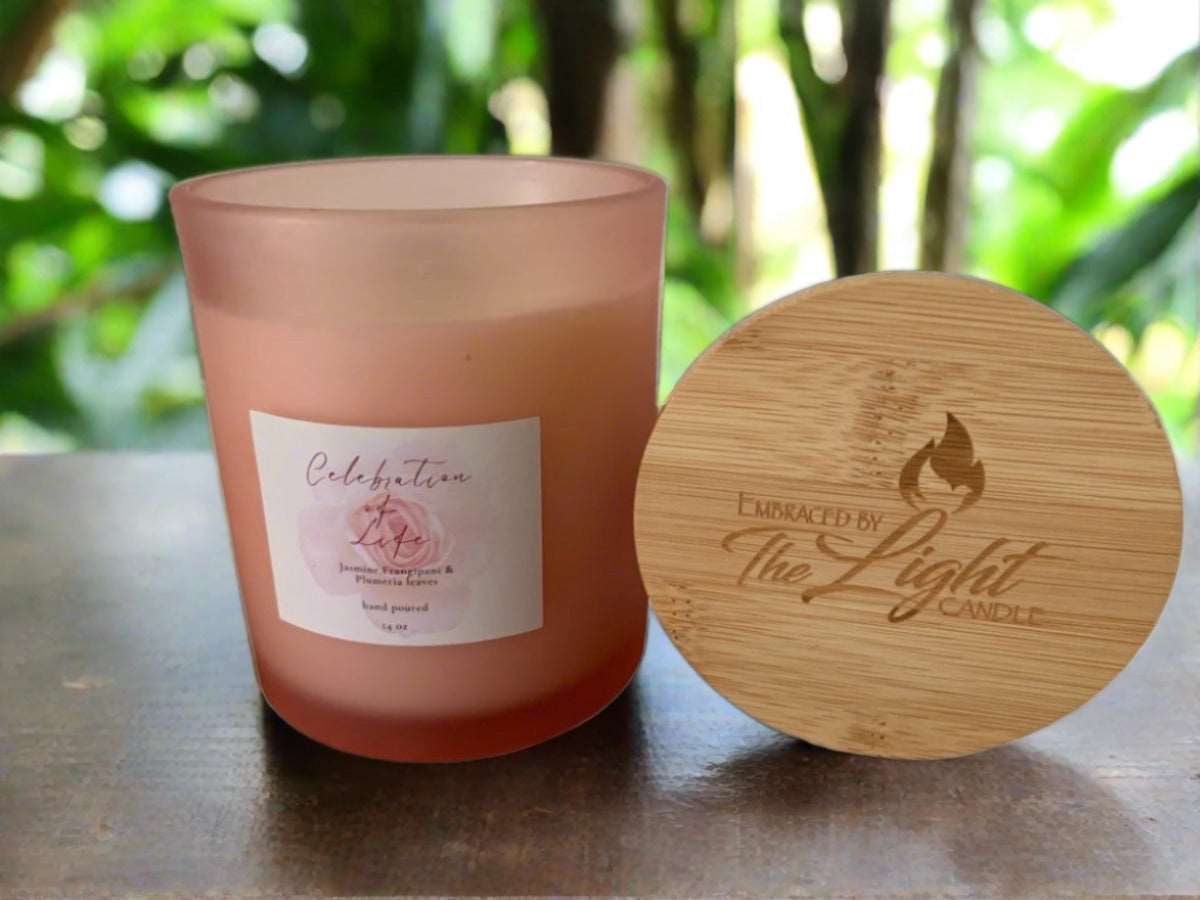 Add a touch of warmth and comfort to your home with our hand poured 14 oz Celebration of Light Fragranced Soy Candle. Made from all-natural soy wax and infused with a delightful woodsy scent, this candle provides you with up to 85 hours of burn time.
