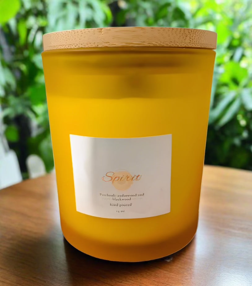 Elevate the ambiance of your home with our 14 oz Spirit Fragrance Soy Candle that fills your space with a captivating aroma and cozy glow. Made from natural soy wax and wood wick, this candle is a perfect addition to your home decor collection.