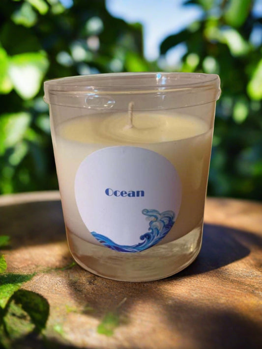 Illuminate your space with our 11oz Ocean Soy Blend Candle. Made with a blend of clean-burning soy wax, our candle provides up to 25 hours of refreshing ocean scents. Enjoy a longer lasting and eco-friendly option for creating a calming ambiance in any room.